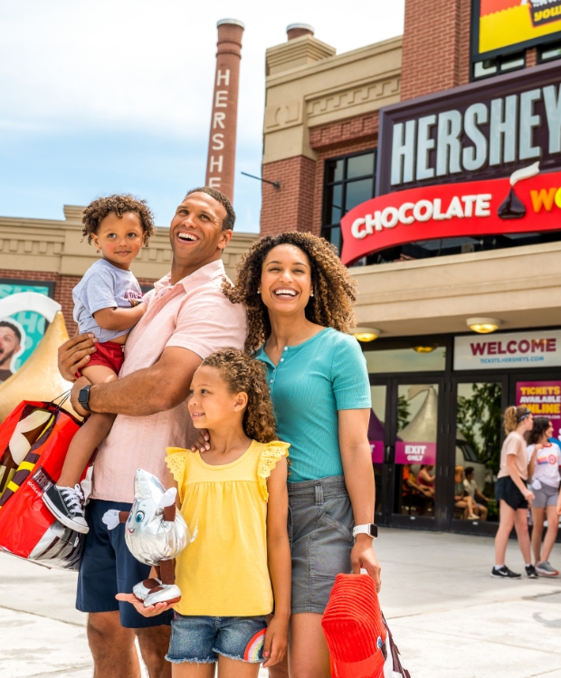 Family taking a selfie outside Hershey's Chocolate World