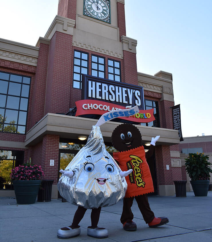 Family taking a selfie outside Hershey's Chocolate World