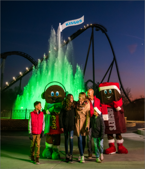 Family enjoying Hersheypark with Hershey Characters
